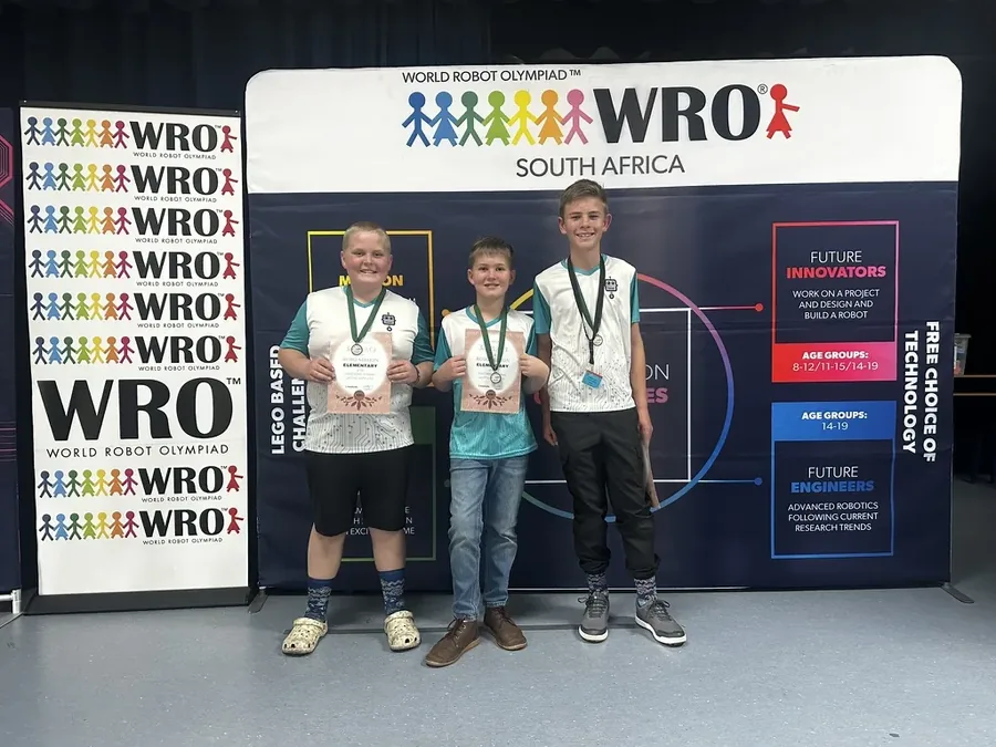 RoboMission Elementary team with medals and certificates