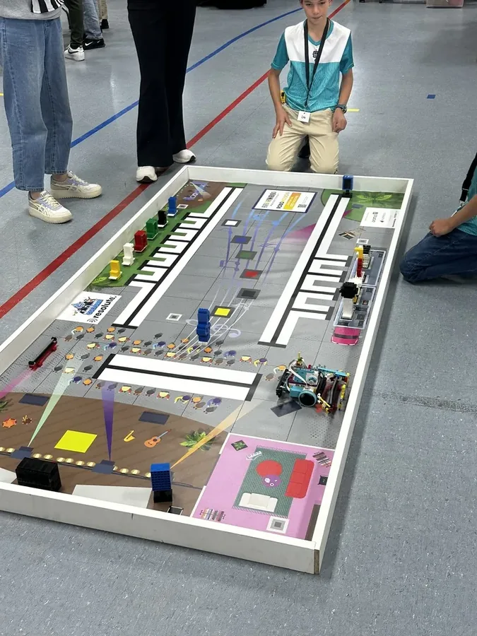 Robot competing on the WRO game mat