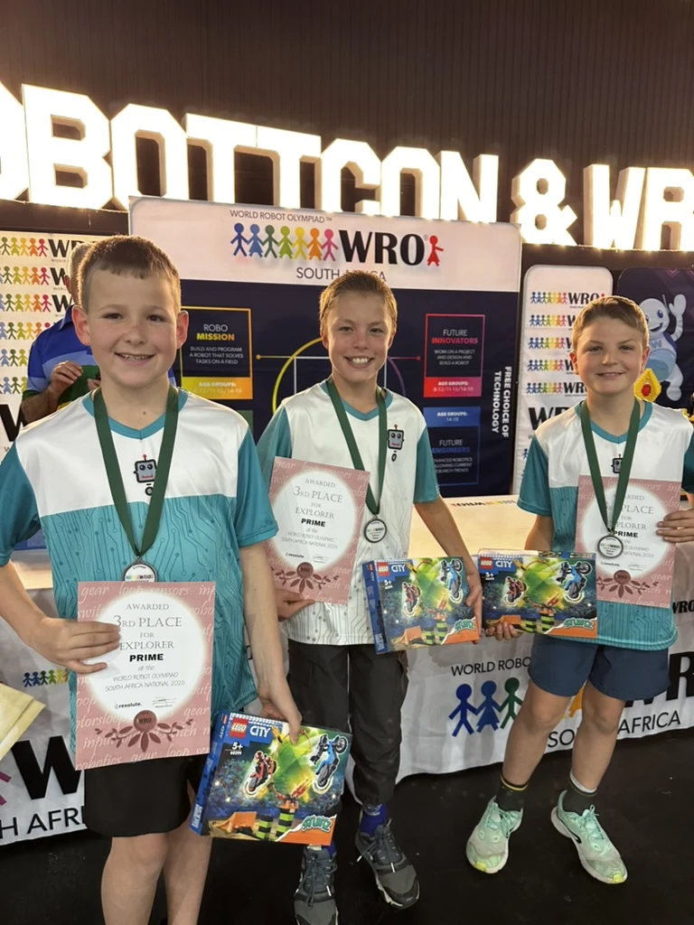 Three students holding 3rd Place Explorer Prime certificates at the WRO South Africa National Final 2026
