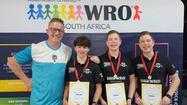 RoboMission Senior team with coach and 1st place certificates